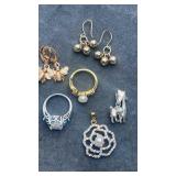 Misc jewelry. Size 5 rings. Earring and charms