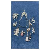 14k gold charm holder and charms  8.5g