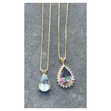 14k necklaces. Blue charm is not gold 5.1g