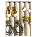 Gold Tone pierced earring collection.