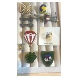 Military, souvenir and specialty pins. Army one
