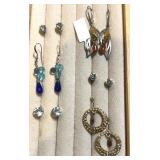 Pierced earrings.