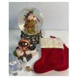 Various Christmas items, including snow globe
