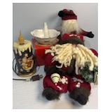 Two stuffed Santa, battery candle and small dish