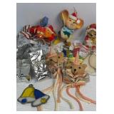 Assortment of ornaments including silver presents