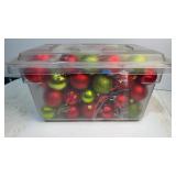 Bin of red and green ornaments