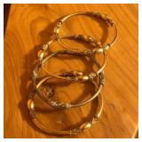 (3) Gold Tone (1) Silver Tone Bangle Bracelets