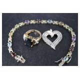 Sterling tennis bracelet with colored stones, chan