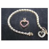 Sterling tennis bracelet with heart charm & sterli