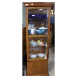 Four shelf display cabinet with hidden under cabin
