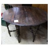 Cherry drop leaf gate legged table
