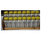 16 Griffiths yellow lidded milk glass spice contai