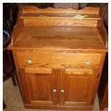 Contemporary 2 door wash stand.Oak