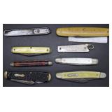 Eight pocket knives: Saks clothing, Sunshine biscu