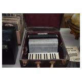 Accordion.  Italian  black and chrome in case