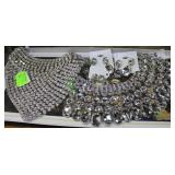 Two bling necklaces and 3 pairs of bling earrings