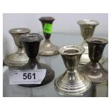 Six weighted sterling candlesticks