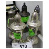 Four weighted sterling salt & pepper shakers