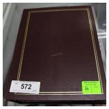 Postcard album with vintage photos, advertisements