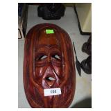 Wood carved stained African face mask