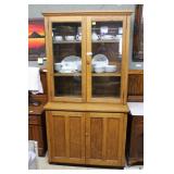 Double door step back oak china cabinet with glass