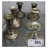 Six weighted sterling candlesticks
