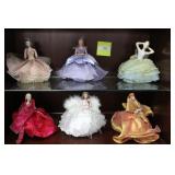 Six Marie Osmond porcelain faced dressing dolls