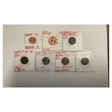 Seven one cent coins - error blank penny, off