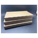 Four uncirculated 2003 coin sets