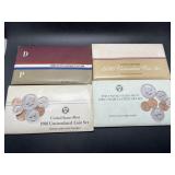 Four uncirculated coin sets - 84, 86, 88, 89