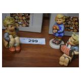 Three Goebel figures - seated, floral girl &