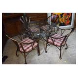 Contemporary metal caster dining table with four