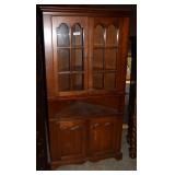 Corner cabinet with double door glass front
