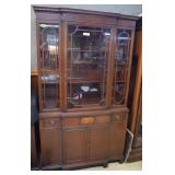 Mahogany upright china cabinet with burled