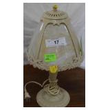 Ornate cast metal lamp w/ slag glass inserts