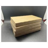 Four unopened 2003 uncirculated coin sets