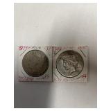 Two silver dollars: 1879 Morgan silver dollar &
