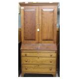 Drop front secretary with three drawers