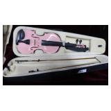 Pink student violin in carry case