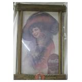 Framed Coca Cola advertisement print