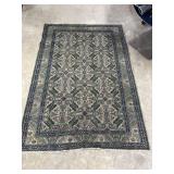 58" x 87" area rug in blue, grey & green hues