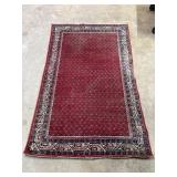 Red background, blue hoarder knotted throw rug 4