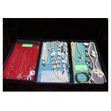 Three trays bone jewelry