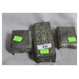 Three metal carved jewelry boxes with costume