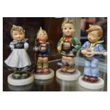 3 Hummel kids playing music, 2Hummel kids hiking,