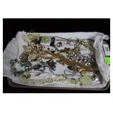 Tray costume jewelry incl.sand dollar earrings,