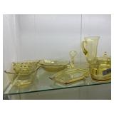 Large shelf lot yellow depression glass: cups,