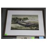 Watercolor on paper  of beached boat on river