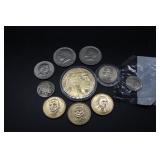 US currency: Three Sacagawea dollars, State