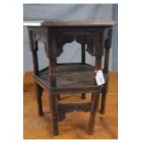 Carved top occasional tableIntricate craft